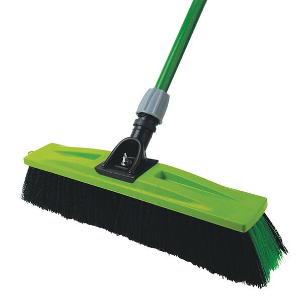 The image displays a Sabco All-Purpose Bristle Broom with a green head, long black bristles, and a green handle connected by a grey adjustable mechanism.